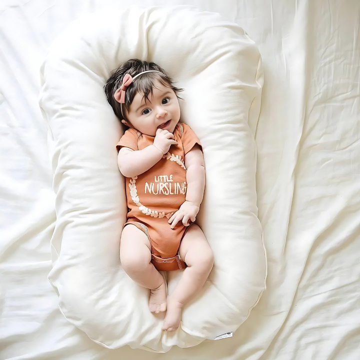 Orthopaedic baby pillow with breathable fabric, prevents flat head, supports alignment, and is perfect for baby sleep.