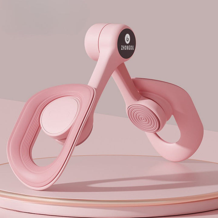 Pink adjustable pelvic and thigh trainer, compact design with digital counter, suitable for all fitness levels and portable.