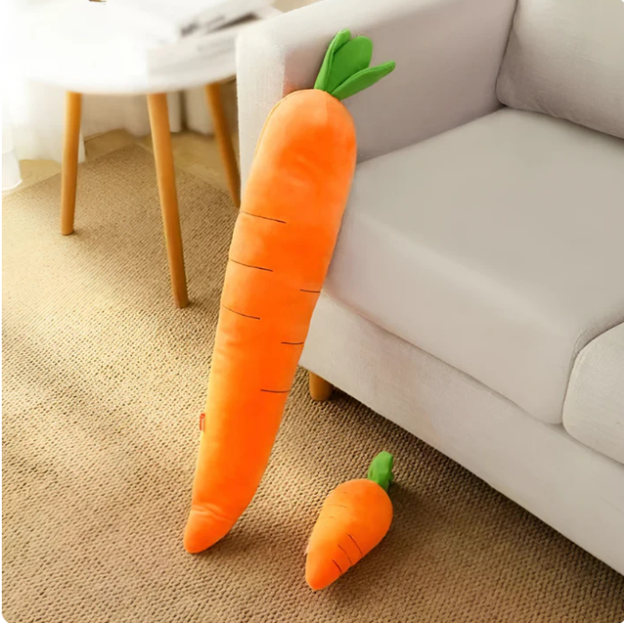 Plush carrot dog toy with soft orange fabric, green leafy top, durable squeaker; perfect for play and snuggles.