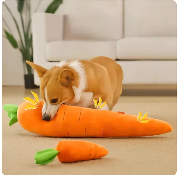 Plush carrot dog toy with soft orange fabric, green leafy top, durable squeaker; perfect for play and snuggles.