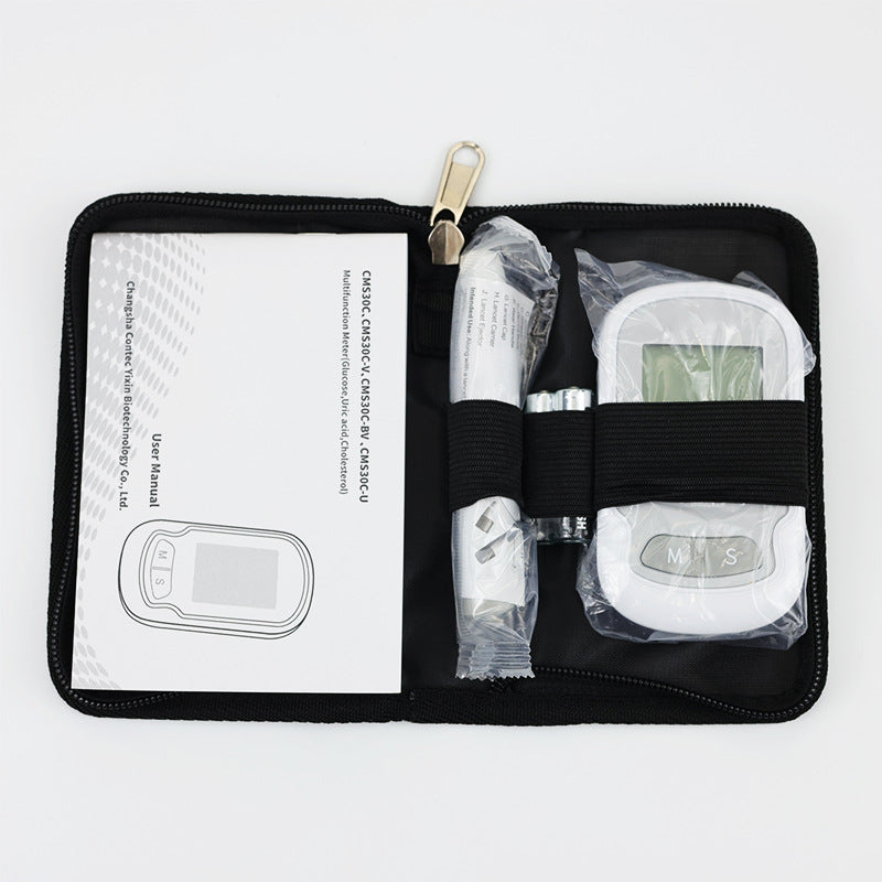 "Portable cholesterol test kit for home use; compact device with test strips and lancets for easy heart health monitoring."
