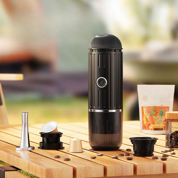 Portable electric espresso machine with USB-C, black, compact, features sleek design, perfect for travel, uses capsules/groun