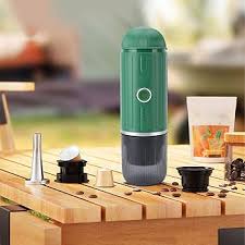 Portable electric espresso machine with USB-C, black, compact, features sleek design, perfect for travel, uses capsules/groun