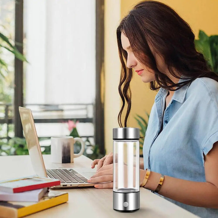 Portable hydrogen water bottle generator with electrolysis technology, clear durable design, and 450mL capacity for health.