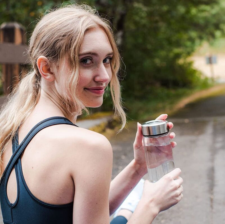 Portable hydrogen water bottle generator with electrolysis technology, clear durable design, and 450mL capacity for health.