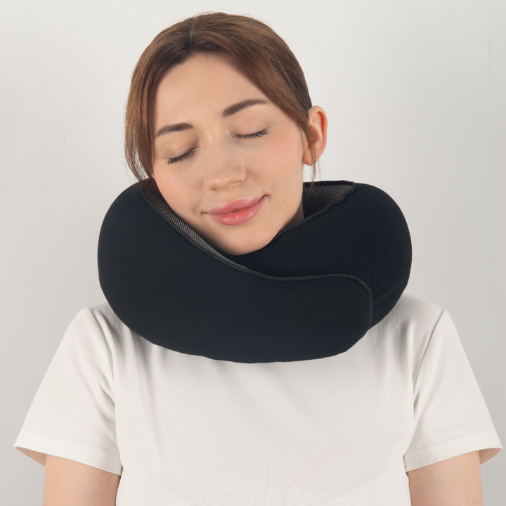 "Premium memory foam travel pillow, ergonomic neck support, sleek design, ideal for unisex comfort on-the-go."