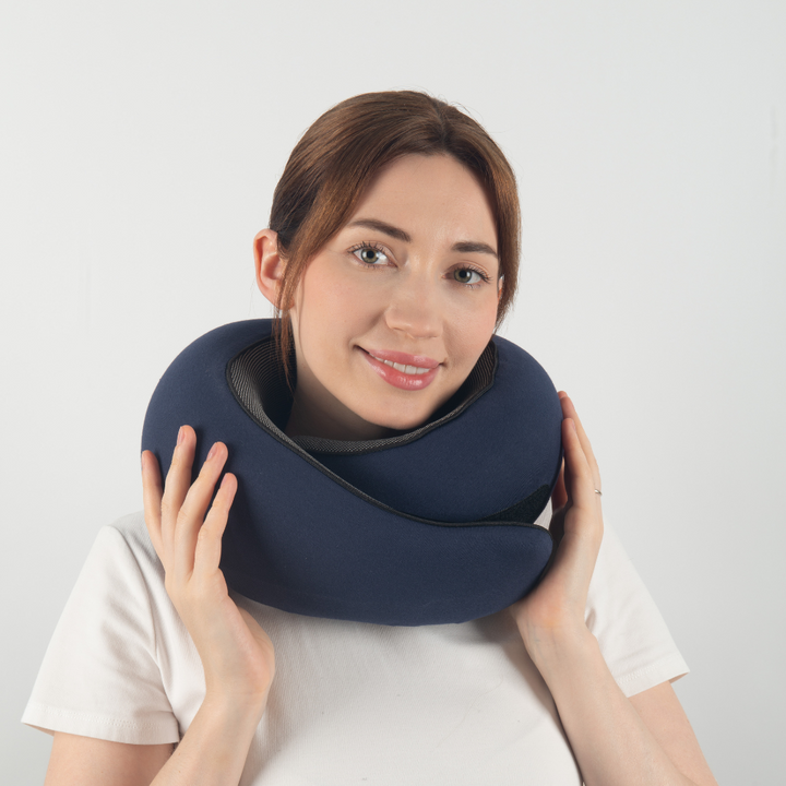 "Premium memory foam travel pillow, ergonomic neck support, sleek design, ideal for unisex comfort on-the-go."