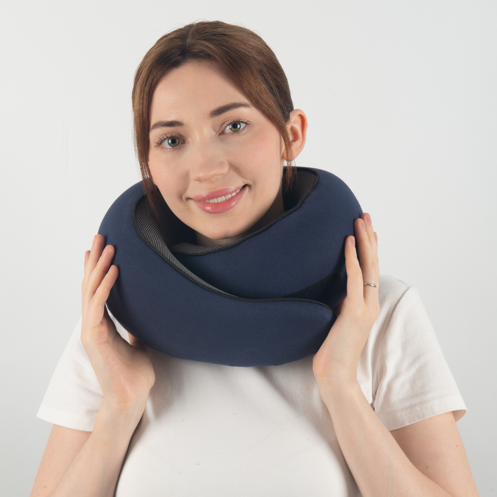 "Premium memory foam travel pillow, ergonomic neck support, sleek design, ideal for unisex comfort on-the-go."