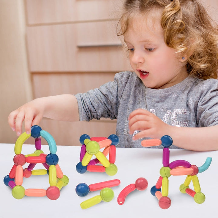 Set of colorful magnetic building blocks for kids, designed to create various shapes and encourage creative play.