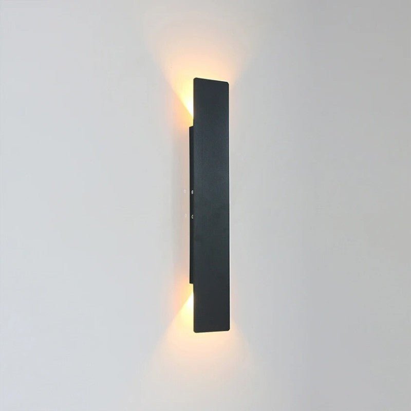 "Sleek black weatherproof LED wall light for outdoor use, featuring modern design and durable aluminum construction."