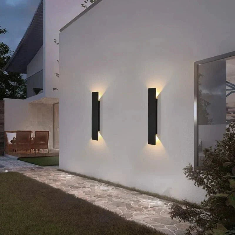 "Sleek black weatherproof LED wall light for outdoor use, featuring modern design and durable aluminum construction."