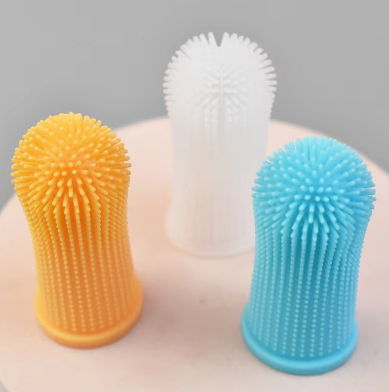 "Soft silicone finger toothbrush for pets, ideal for stress-free dental care with gentle bristles, easy handling for dogs and