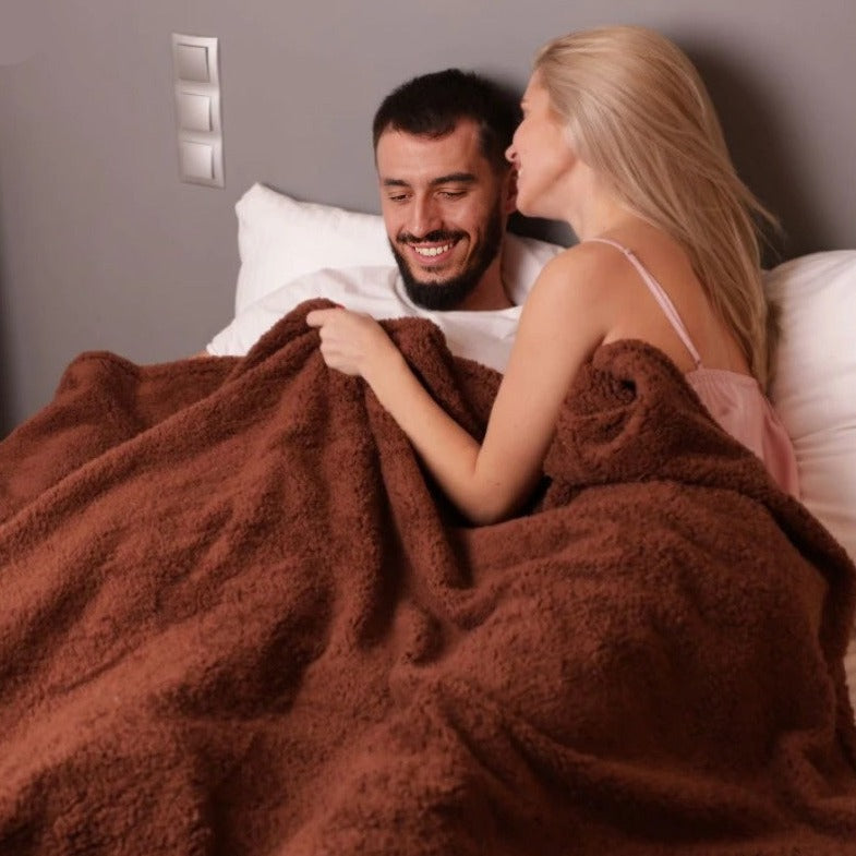 "Soft waterproof intimacy blanket providing comfort and protection, available in various sizes and attractive colors."