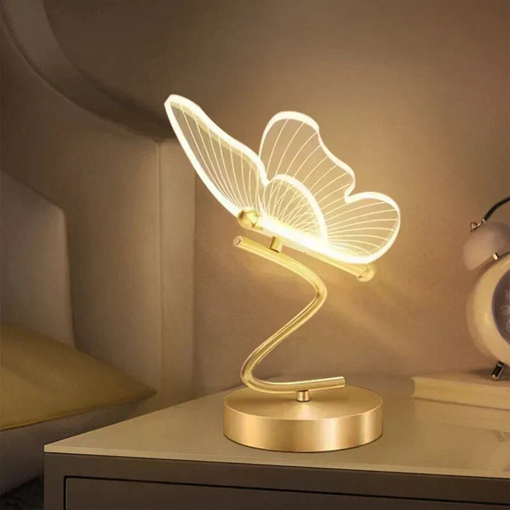 "Stylish LED table lamp with butterfly design, modern unisex decor piece, offering bright and efficient illumination."