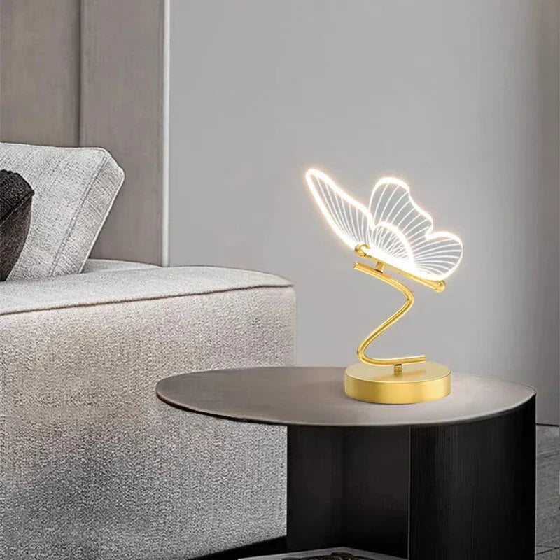 "Stylish LED table lamp with butterfly design, modern unisex decor piece, offering bright and efficient illumination."