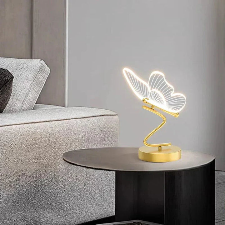 "Stylish LED table lamp with butterfly design, modern unisex decor piece, offering bright and efficient illumination."