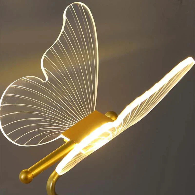 "Stylish LED table lamp with butterfly design, modern unisex decor piece, offering bright and efficient illumination."