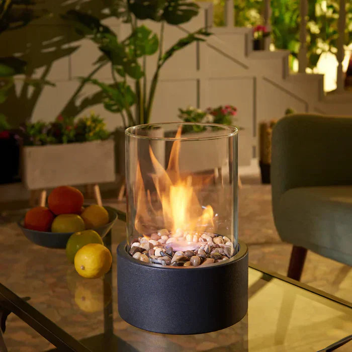 "Stylish portable table fire lantern with sleek design, soft flame flicker, steel and glass construction for cozy decor."