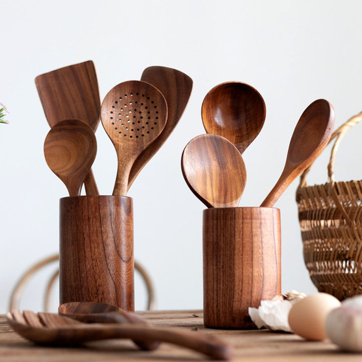 "Teak wood kitchen utensil set with non-scratch, polished finish; includes spoon, spatula, and colander, elegant design."