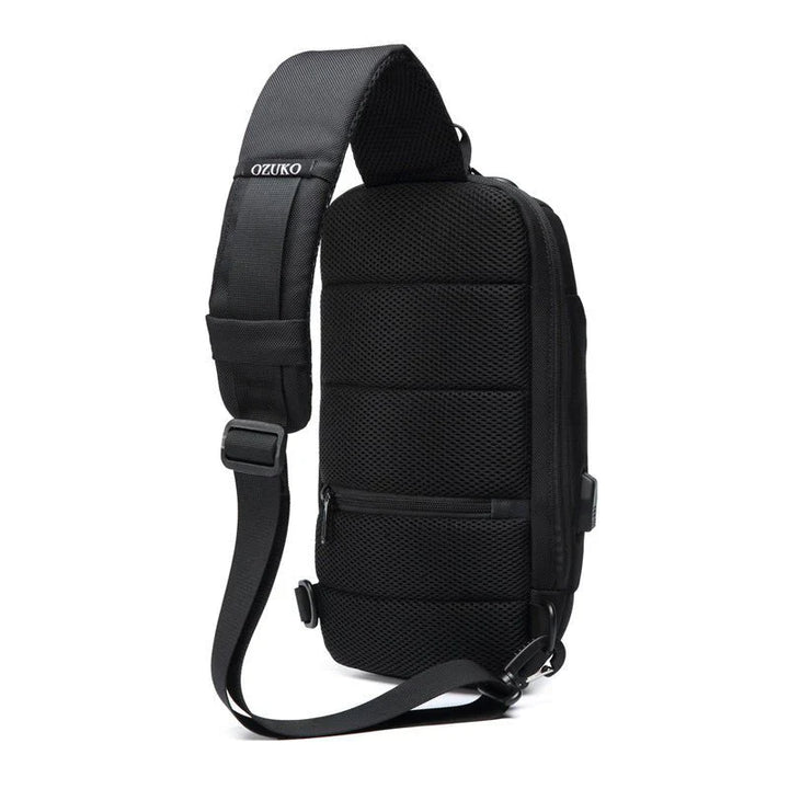 "Unisex anti-theft crossbody bag with USB charging, slash-proof strap, lockable compartment, and hardshell exterior in black.