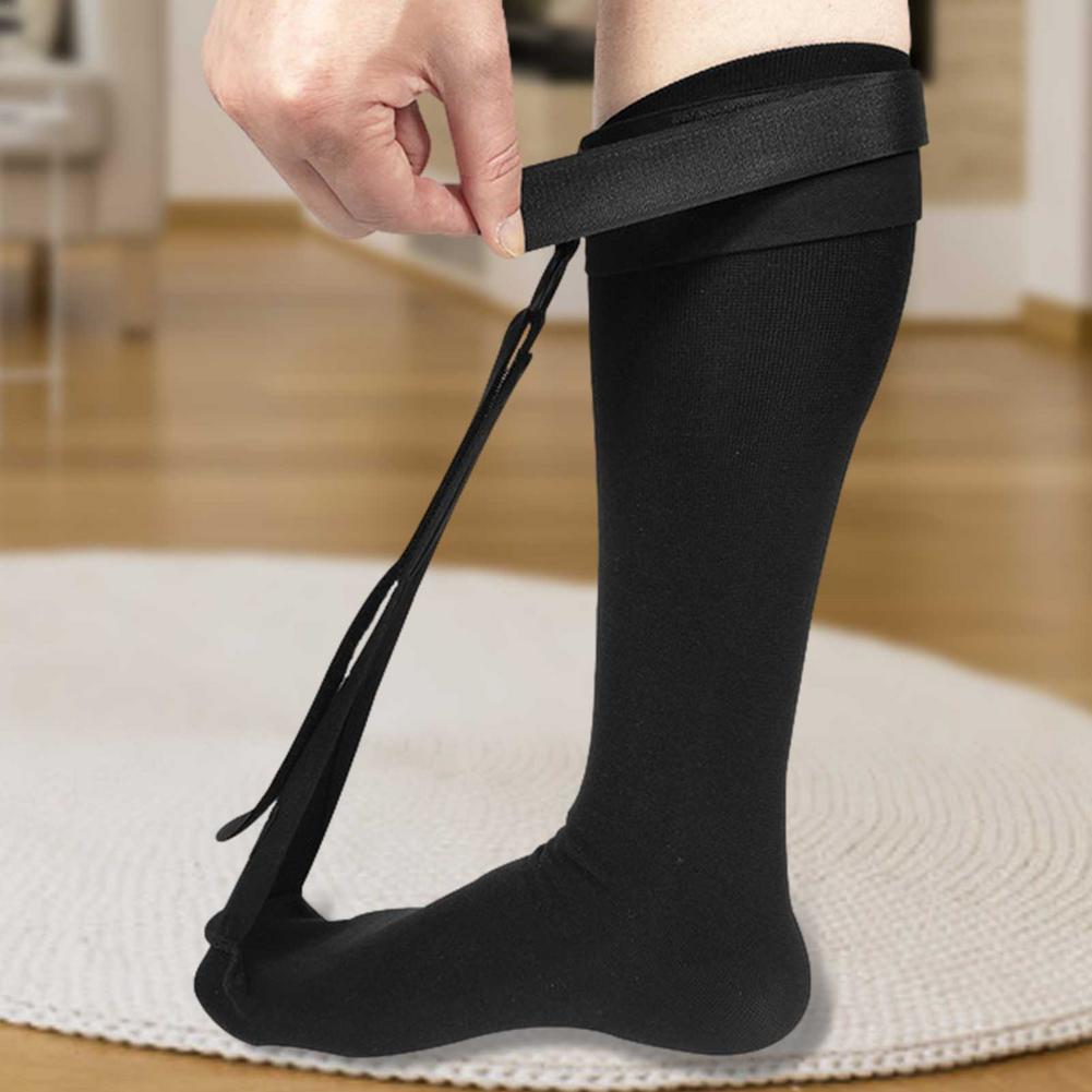 "Unisex black night splint sock for plantar fasciitis, adjustable straps, breathable fabric, health & wellness support"