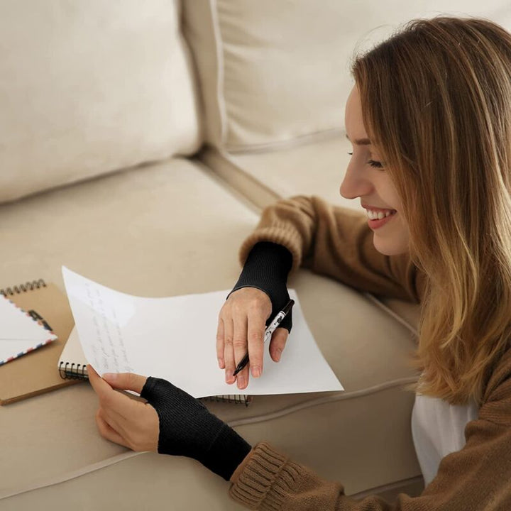 Unisex gel thumb support gloves in black, featuring gel cushions for joint pain relief and arthritis support. Health & Wellne
