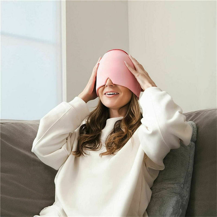 Unisex migraine relief cap in black, offers hot and cold therapy, soft fabric, covers eyes, designed for headache relief.