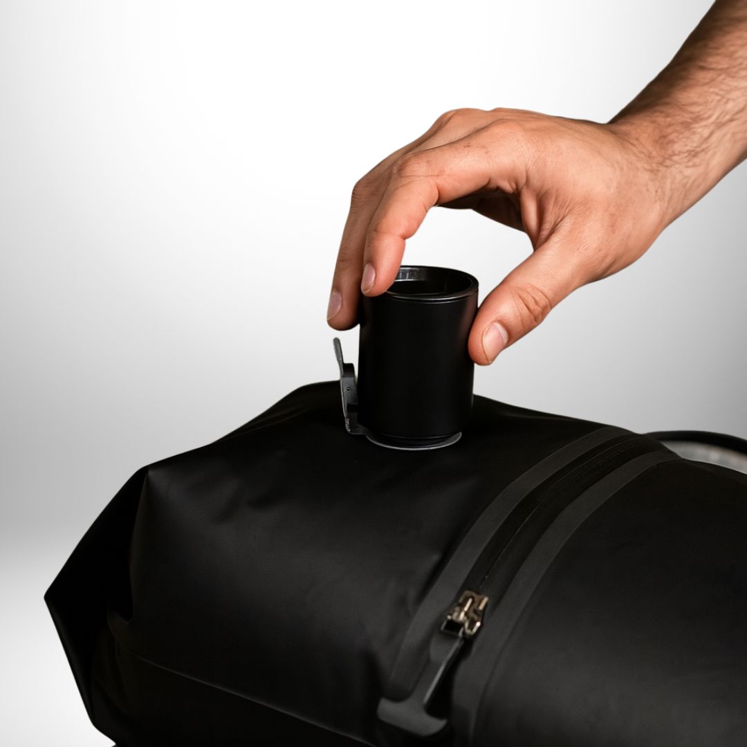 "Vacuum bag travel kit with compact pump for efficient packing, fits 15 items, airtight seal protects clothes."