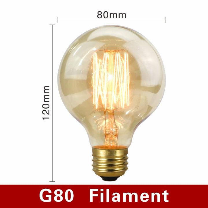 Vintage-style amber light bulbs emitting warm glow, suitable for cozy settings, with filament detail and dimmable feature.