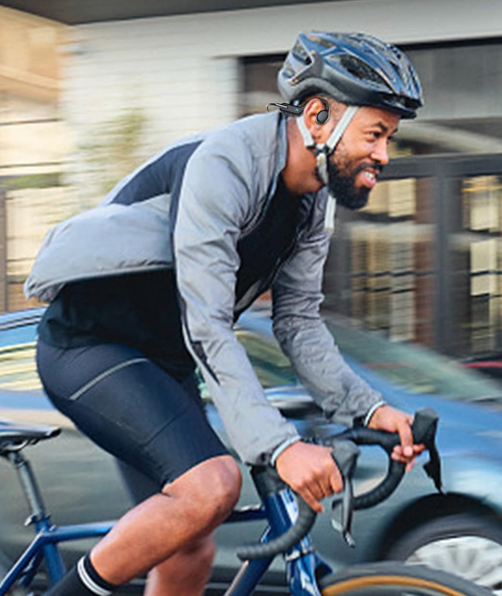 "Waterproof bone conduction swimming headphones with Bluetooth, ergonomic open-ear design, suitable for underwater use."