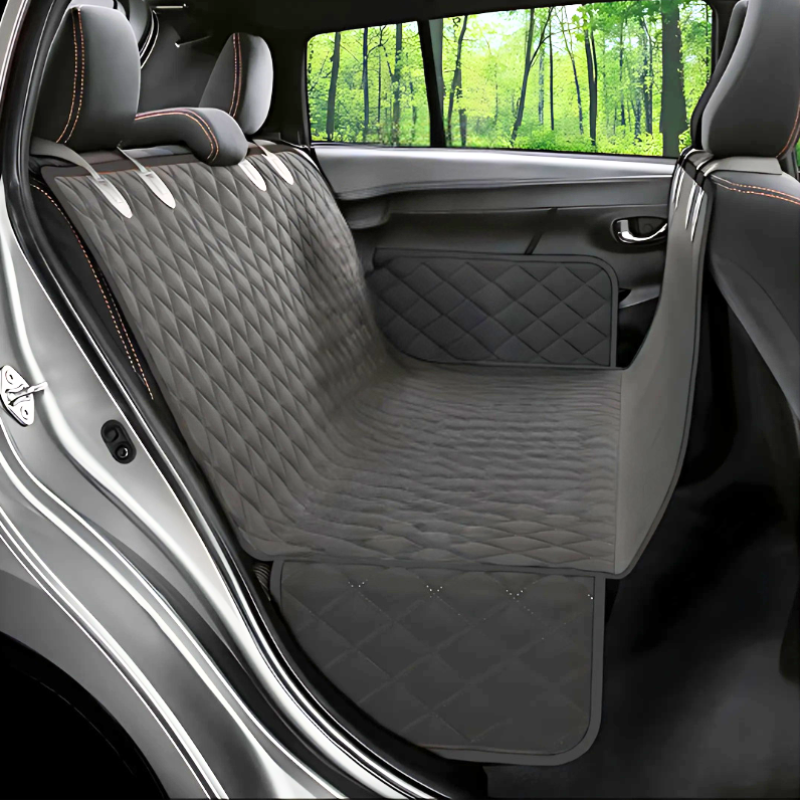 Waterproof pet car seat cover with non-slip design for dogs, providing plush comfort and protection in backseat.