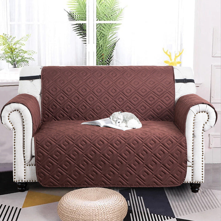 "Water-repellent non-slip reversible sofa cover protecting couch from spills and stains with pet sitting on it"
