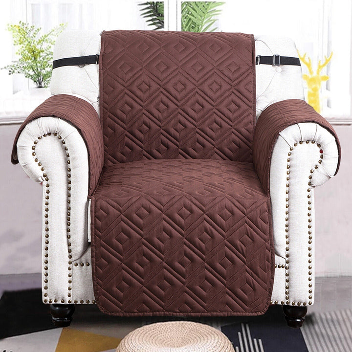 "Water-repellent non-slip reversible sofa cover protecting couch from spills and stains with pet sitting on it"