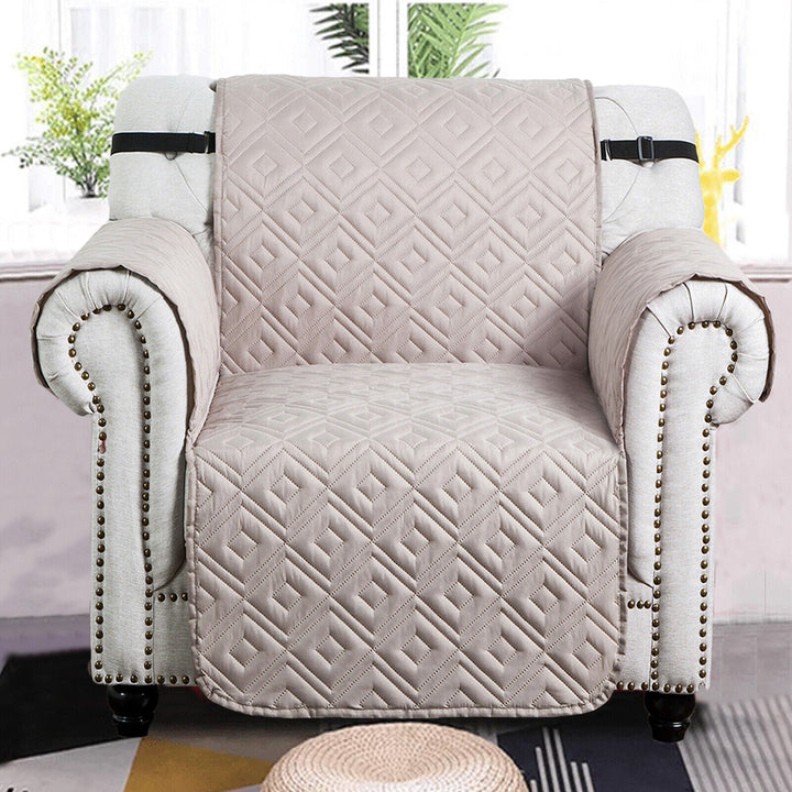 "Water-repellent non-slip reversible sofa cover protecting couch from spills and stains with pet sitting on it"