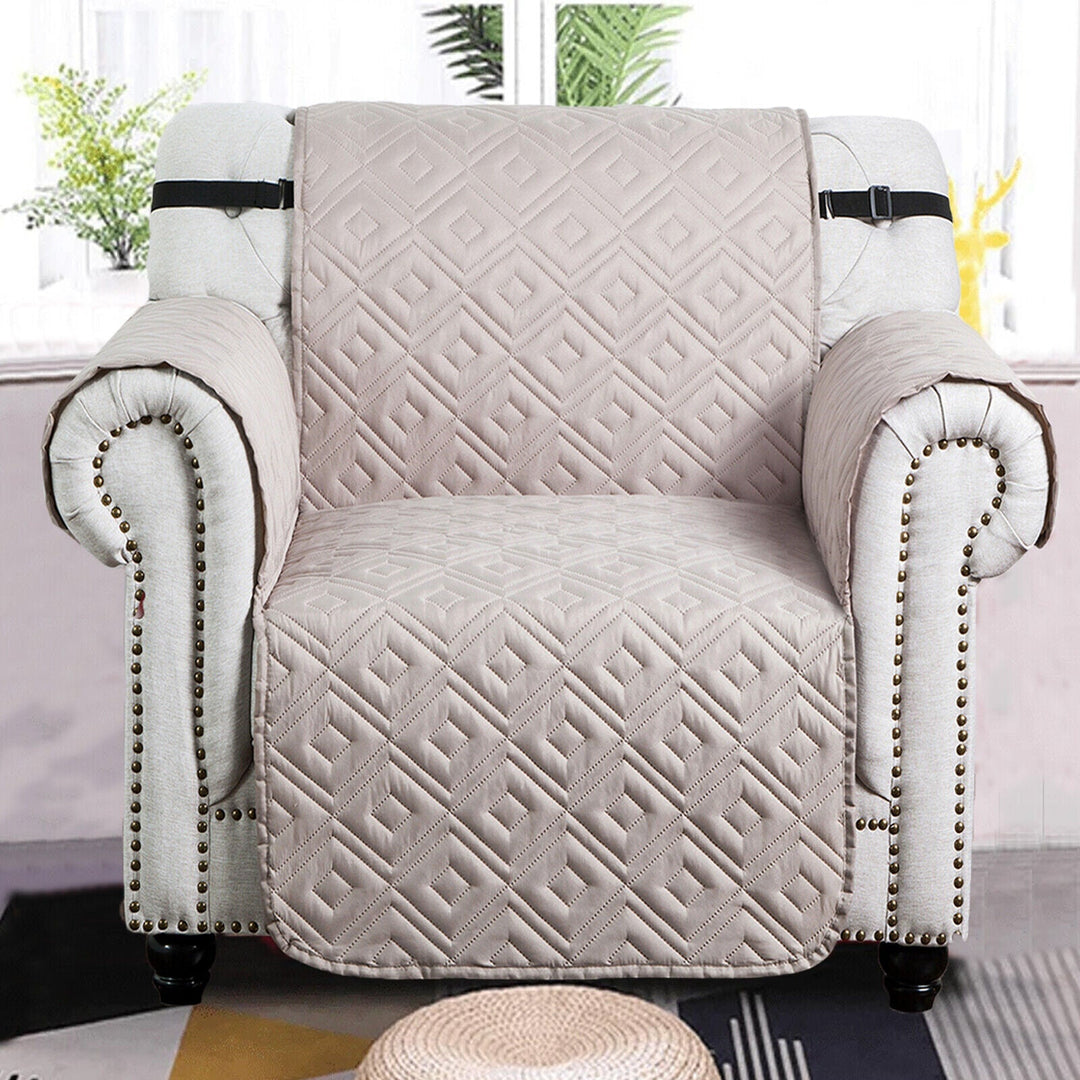 "Water-repellent non-slip reversible sofa cover protecting couch from spills and stains with pet sitting on it"