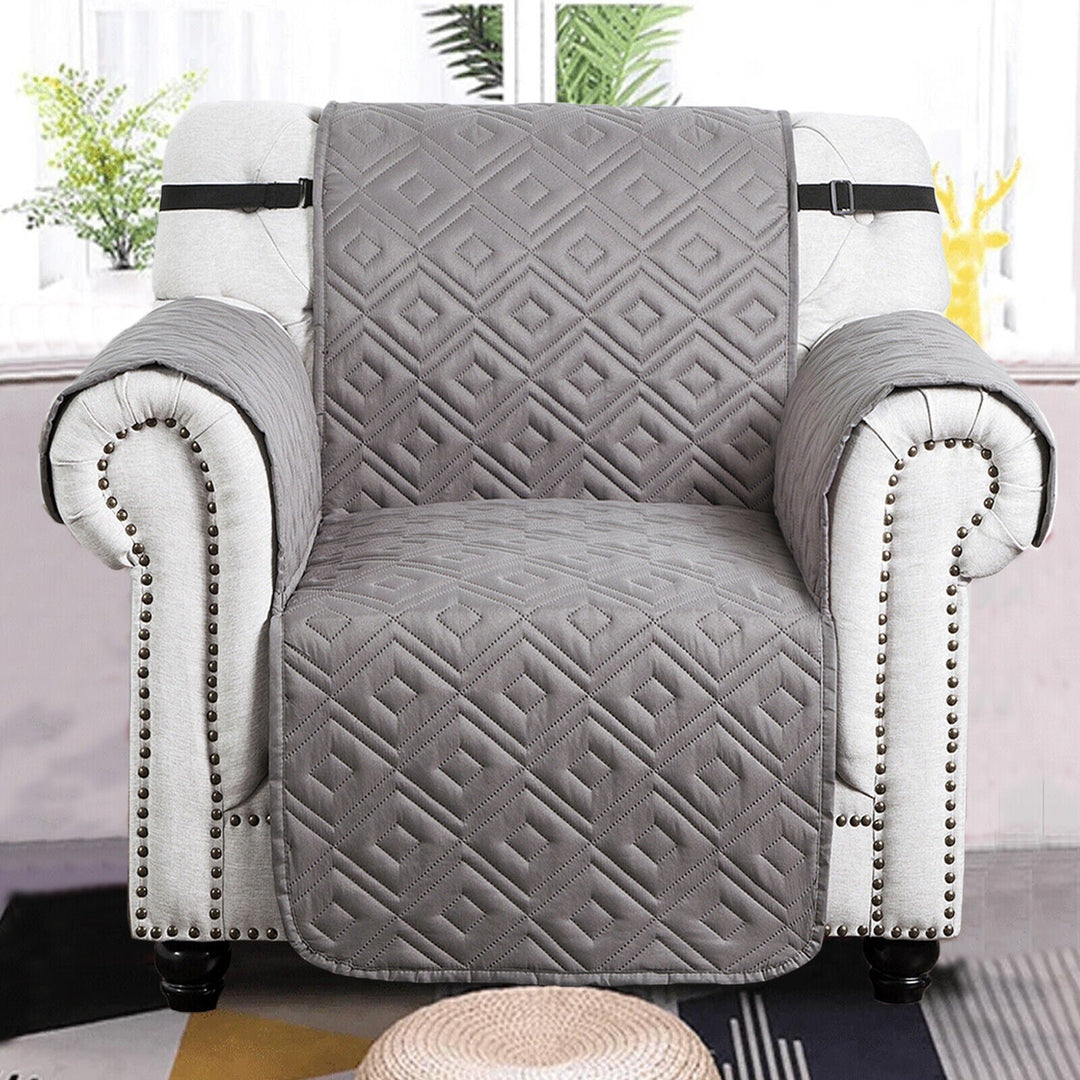 "Water-repellent non-slip reversible sofa cover protecting couch from spills and stains with pet sitting on it"