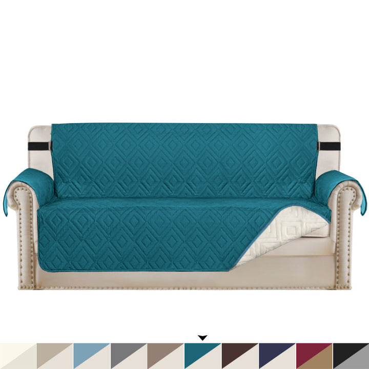 "Water-repellent non-slip reversible sofa cover protecting couch from spills and stains with pet sitting on it"