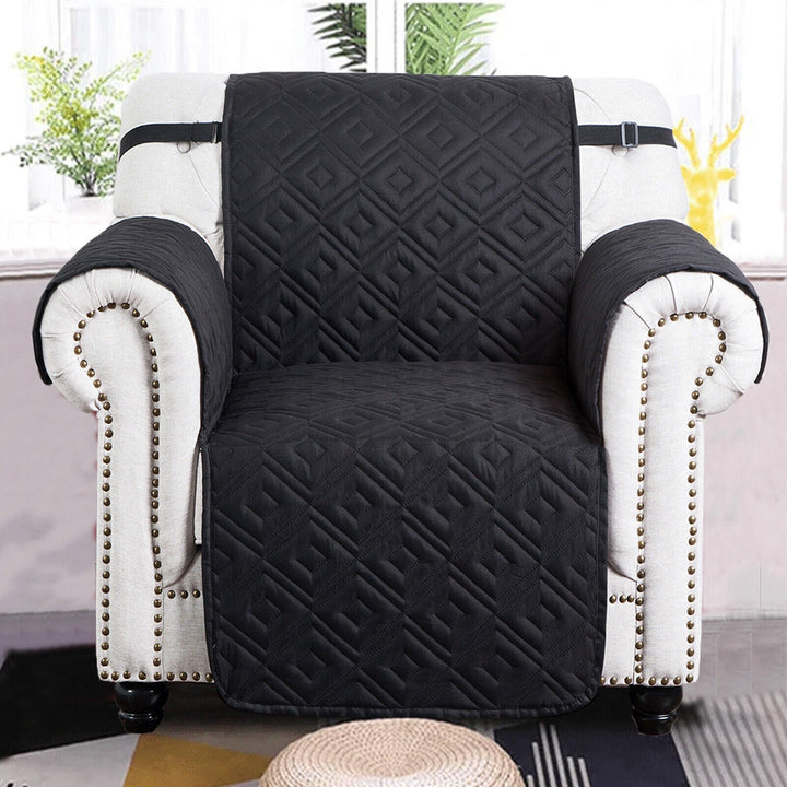 "Water-repellent non-slip reversible sofa cover protecting couch from spills and stains with pet sitting on it"