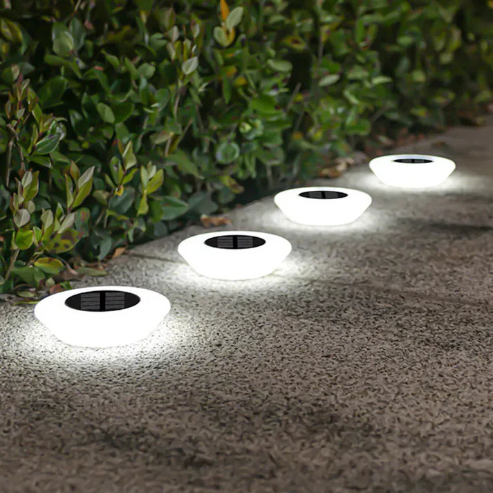 Weatherproof solar outdoor garden light, rust-proof ABS, warm white glow, IP65-rated, eco-friendly and durable design.
