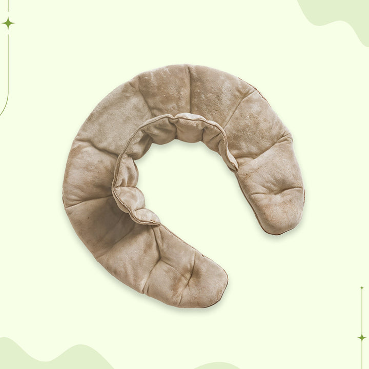 "Weighted Neck & Shoulder Wrap in beige, showing ergonomic design with even distribution for stress relief and relaxation."