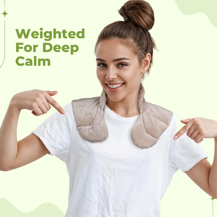 "Weighted Neck & Shoulder Wrap in beige, showing ergonomic design with even distribution for stress relief and relaxation."
