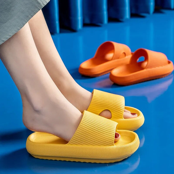 Women's Luxe Platform Cloud Slippers in vibrant hues with cushioned soles, non-slip design for indoor comfort and style.
