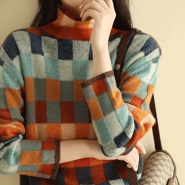 Women's cashmere patchwork turtleneck sweater in mélange hues, showcasing a unique, cozy, and stylish design for winter.
