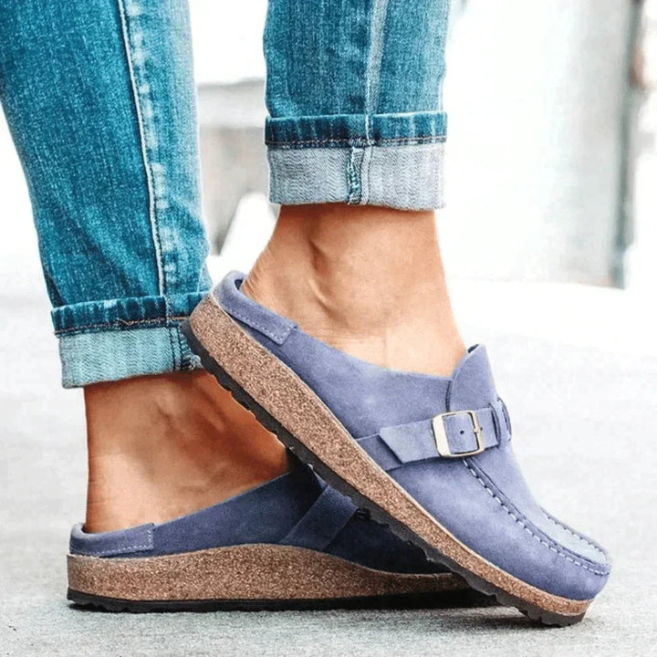 Women's casual comfort clogs in vibrant colors, slip-on design with cushioned footbed and durable soles for all-day wear.