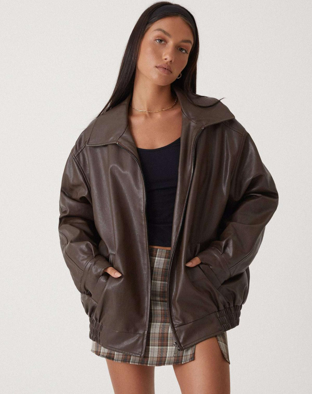 Women's classic PU leather jacket, versatile design, sleek fit, bitter chocolate color, ideal for casual stylish wear.