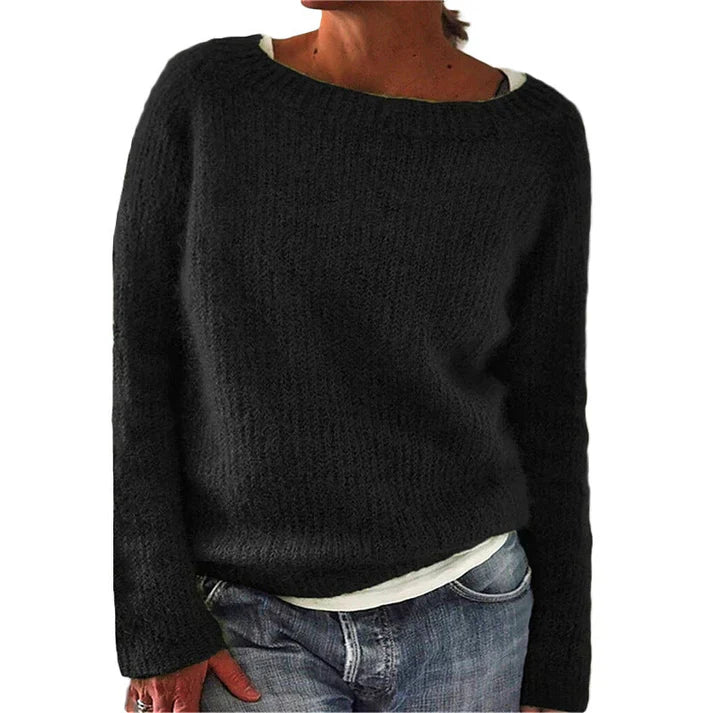 "Women's classic knitted sweater with oversized collar, ribbed details, and crew neck in a cozy, timeless design."