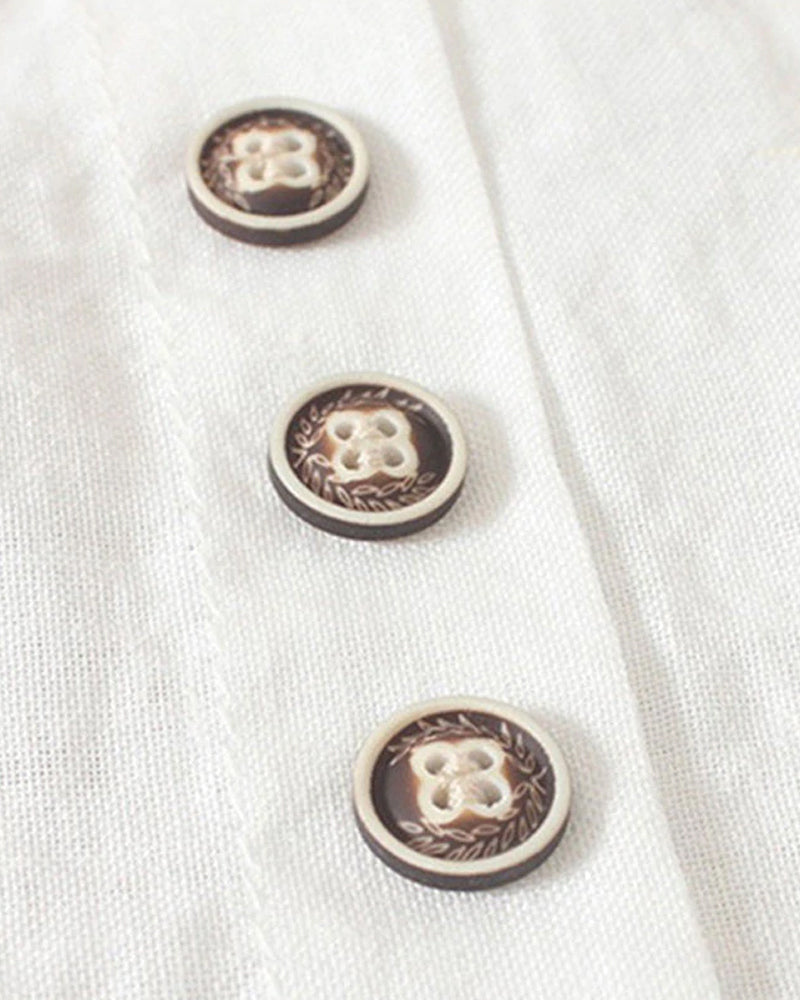 Women's cotton-linen crew neck T-shirt, front view, lightweight, breathable fabric, classic design, subtle button detailing.