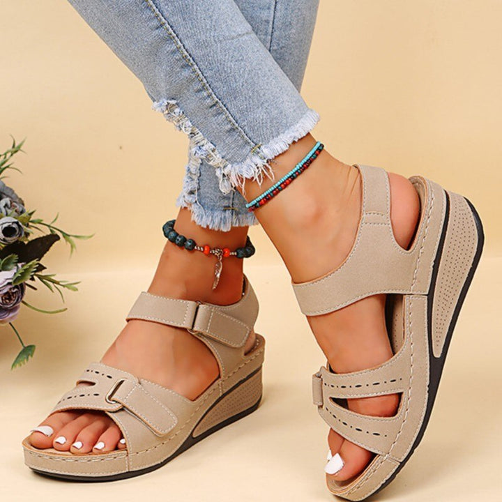 Women's cushioned supportive sandals with comfort soles, elegant design, enhanced arch support, available in several colors.