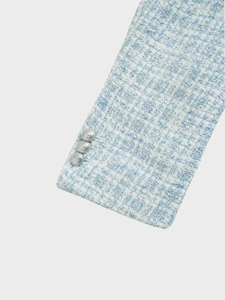 Women's fashionable light blue tweed blazer, front view. Tailored fit, elegant design, classic silhouette for versatile wear.