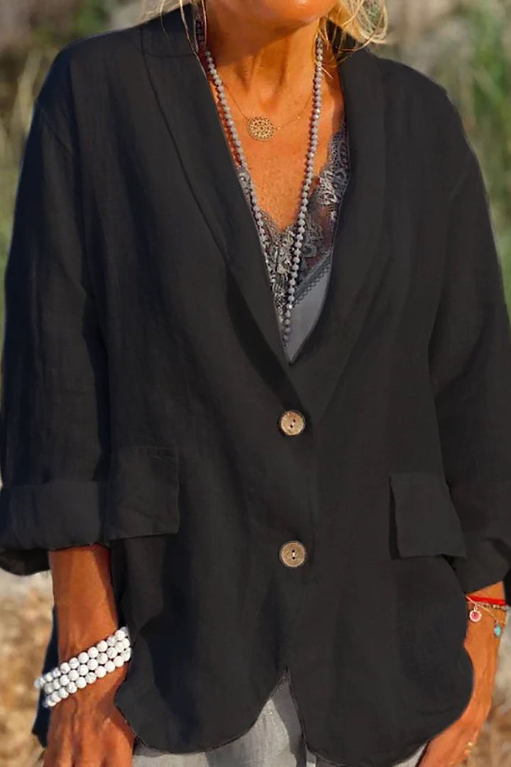 Women's light linen blazer with buttons, V-neck, and long sleeves; shown in white. Perfect for versatile, chic style.